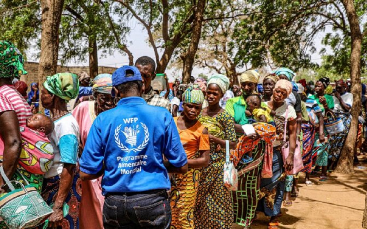 Beneficiaries of WFP cash distribution to vulnerable populations affected by food and nutrition insecurity in the Savanes and Kara regions.